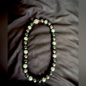 Thick rich purple, silver, and black pearls with beautiful magnetic clasp.